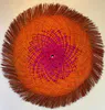 Orange and pink Handwoven dyed Harakeke traditional Maori Porohita by New Zealand artist Bernie Ross, available at The Little Gallery Whangamata